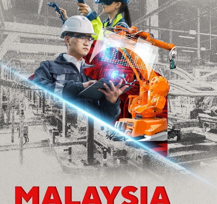 MIDA publication cover titled "Malaysia: Investment in the Manufacturing Sector," featuring two industrial workers — one wearing a hard hat and safety glasses using a tablet, another wearing a VR headset and high-visibility jacket — alongside an orange industrial robotic arm and digital data visuali